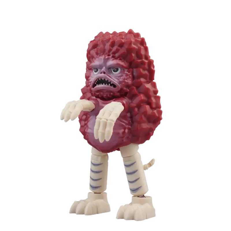 Pigmon kaiju toy figure of a red and white creature
