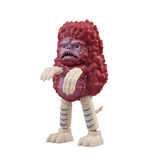 Pigmon kaiju toy figure of a red and white creature
